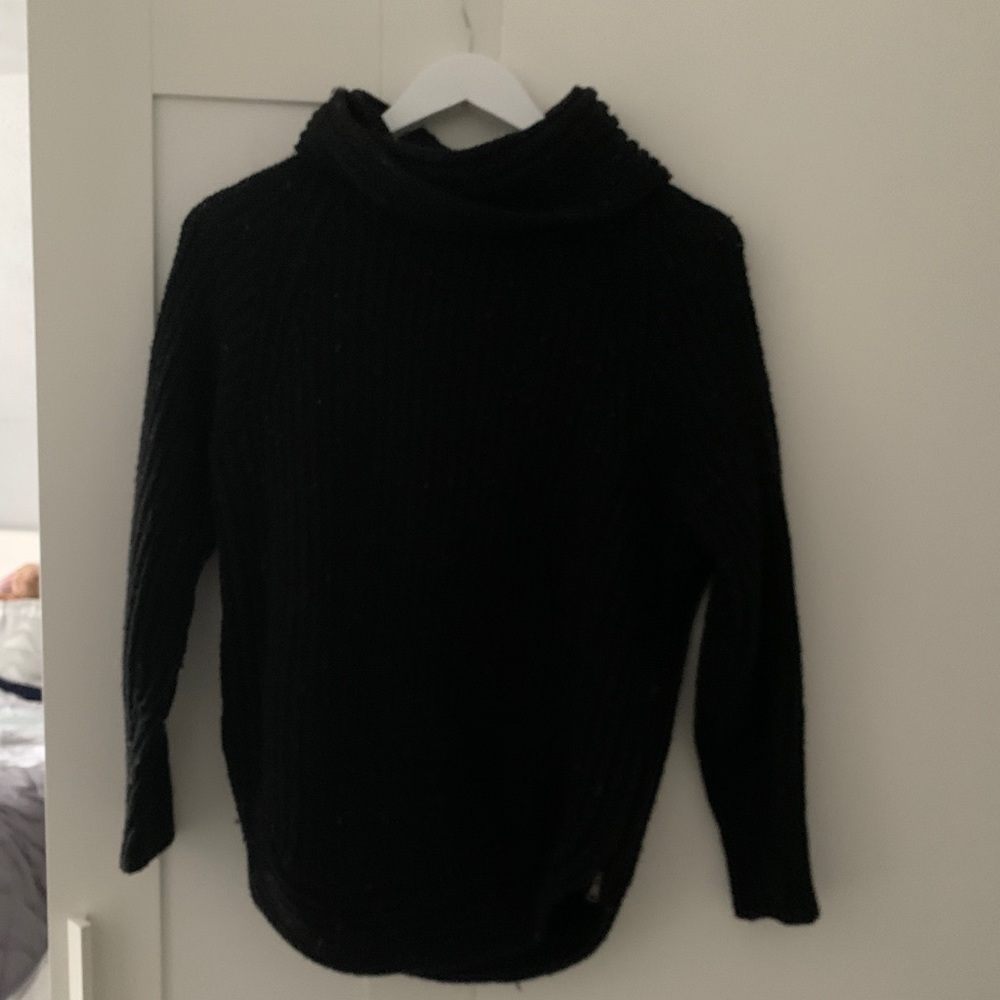 Black turtleneck sweater with white specks
